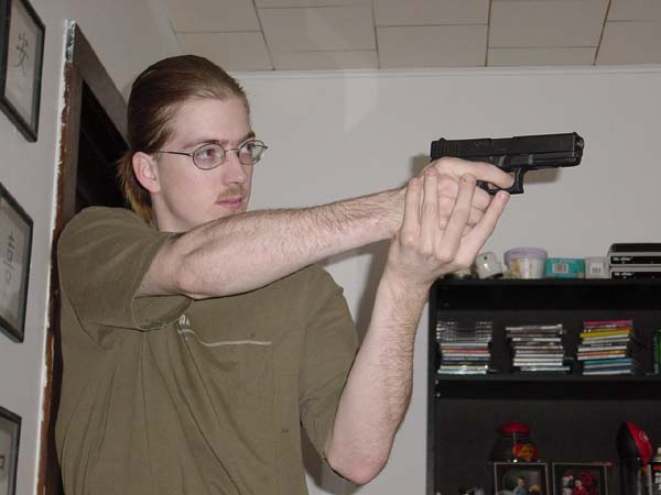 Michael Mimbach, sex offender, with a glock
